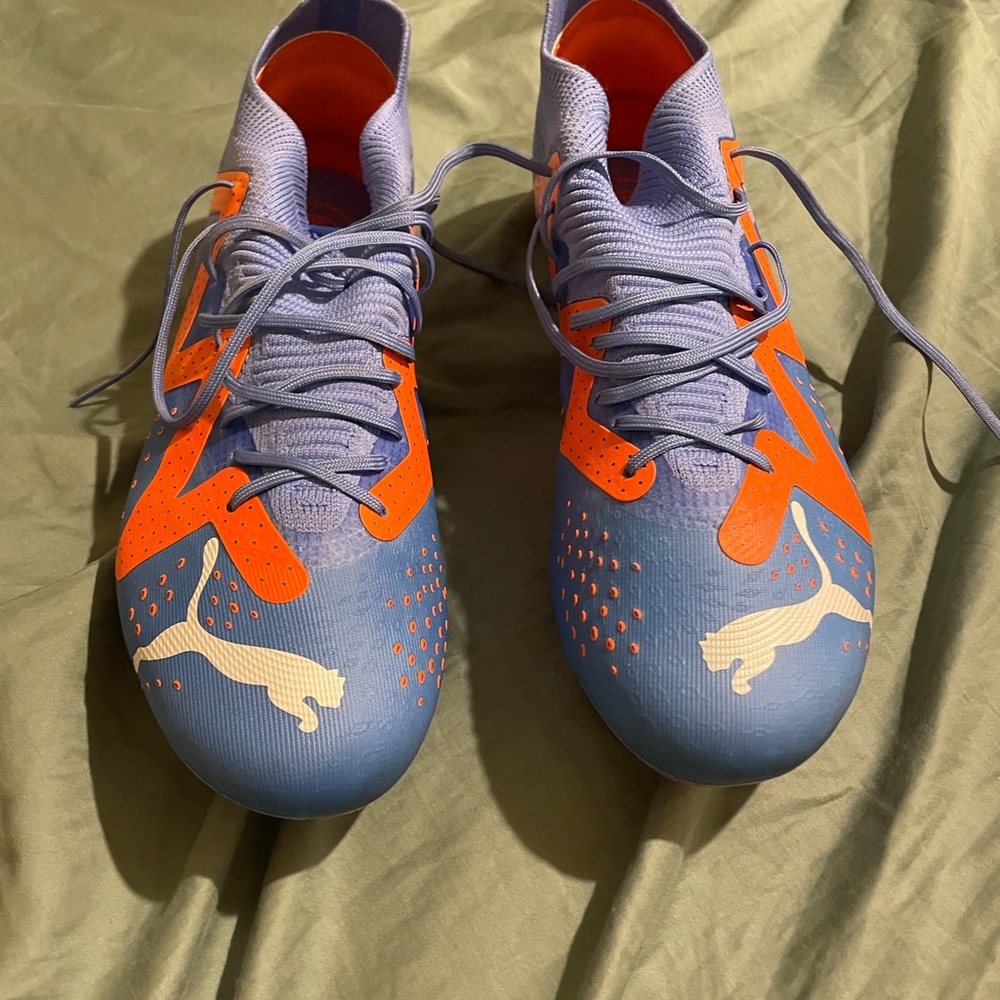 Puma athletic cleats.